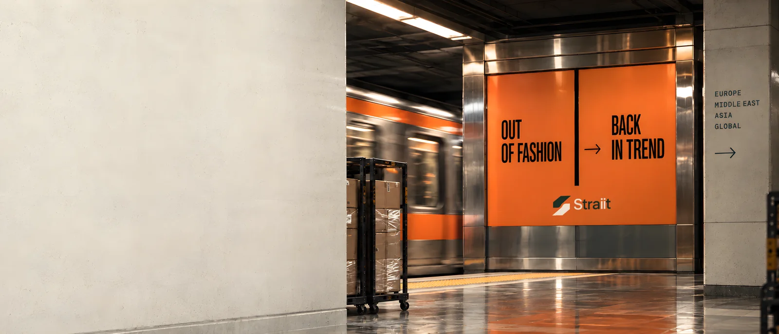 A metro platform. Tall orange doors read: out of fashion, back in trend, Straiit.